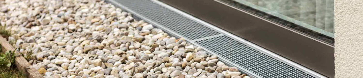 Drainage grate on the outside of residential sliding door