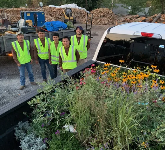 4 Season Land Care contractors on a job site.