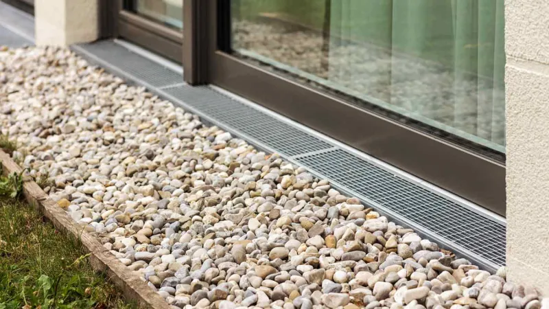 Drainage grate on the outside of residential sliding door